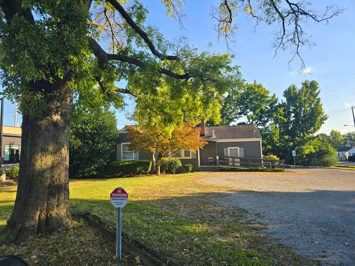 Tree-lined .34-acre corner lot at 609 W Iris Drive and Azalea Place